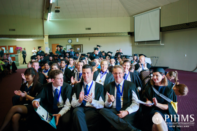 Students in graduation gowns