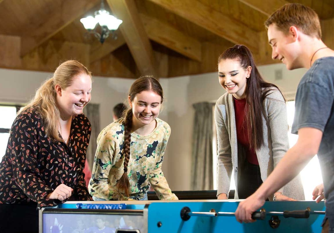 NZ-students-palying-foosball